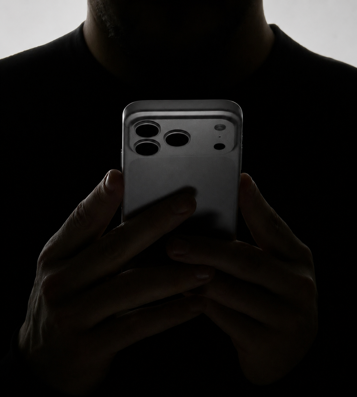 A person holding a phone, protected by Soryx